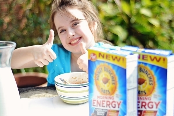 Enjoying Honey Bunches of Oats Morning Energy cereal