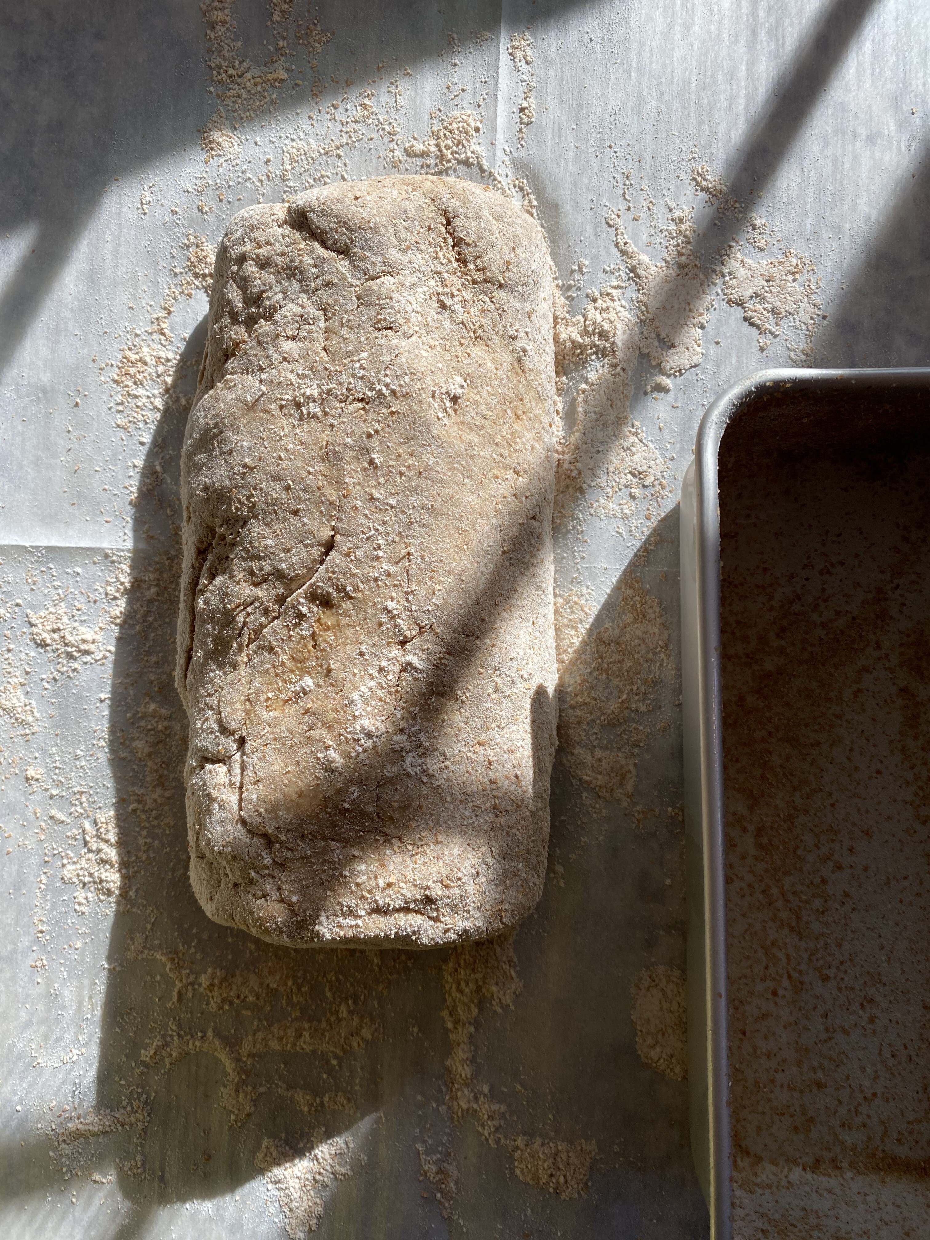 Shaped loaf of brown bread
