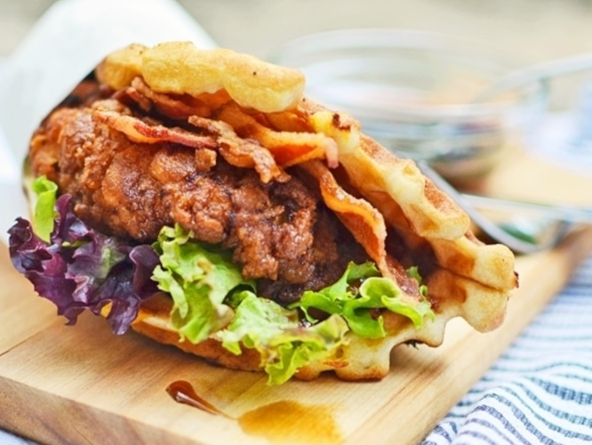Crispy chicken sandwich with bacon and lettuce waffle