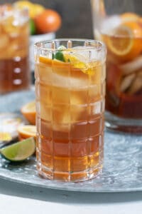 pitcher of southern sweet iced tea with lemon slices and fresh mint