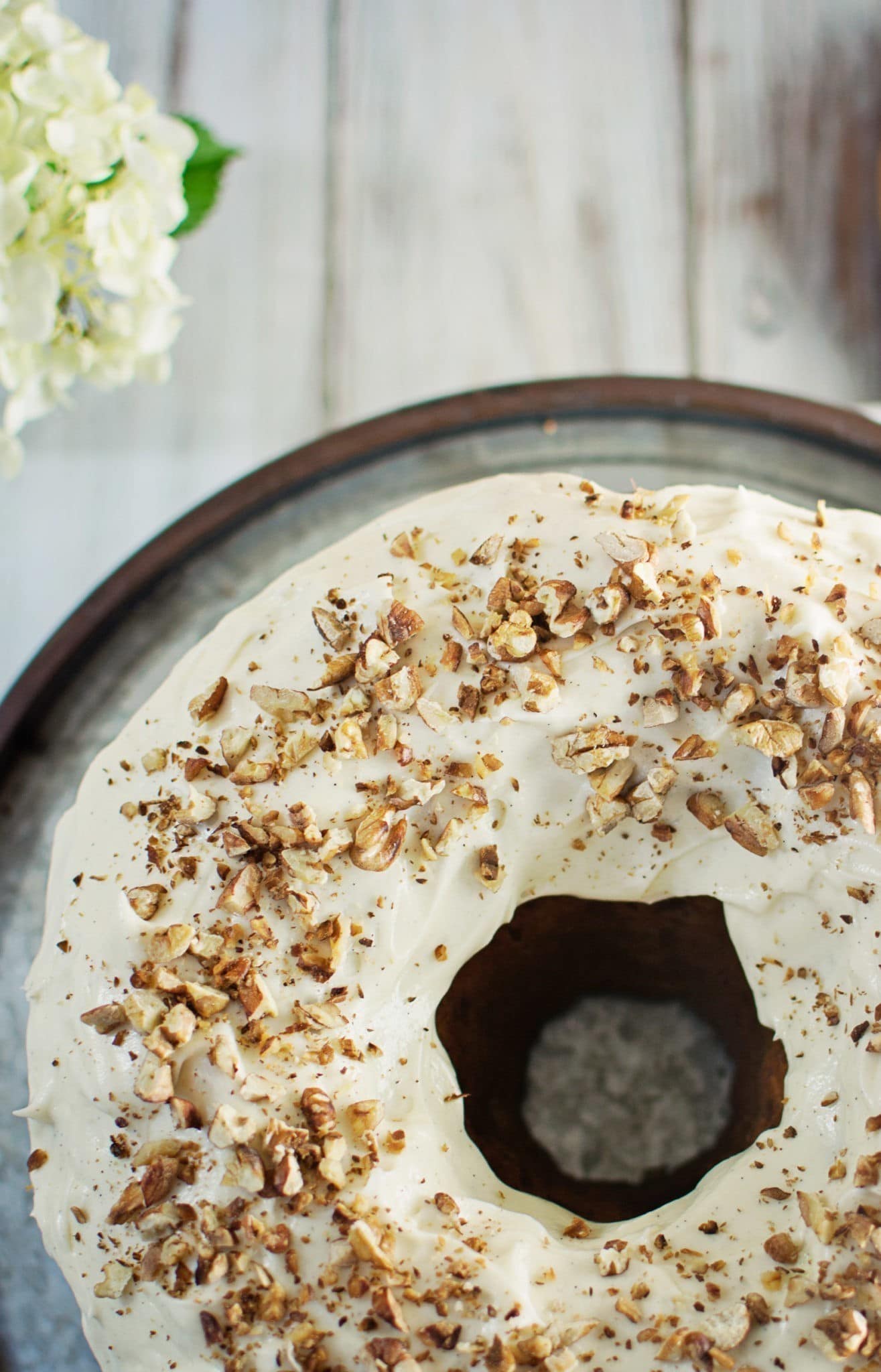 Hummingbird Cake - A gorgeous cake full of Pineapple, Bananas and Pecans topped off with a fluffy Cream Cheese Frosting - recipe @LittleFiggyFood