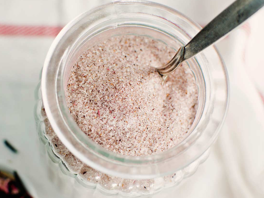 Jar of pink sea salt with spoon