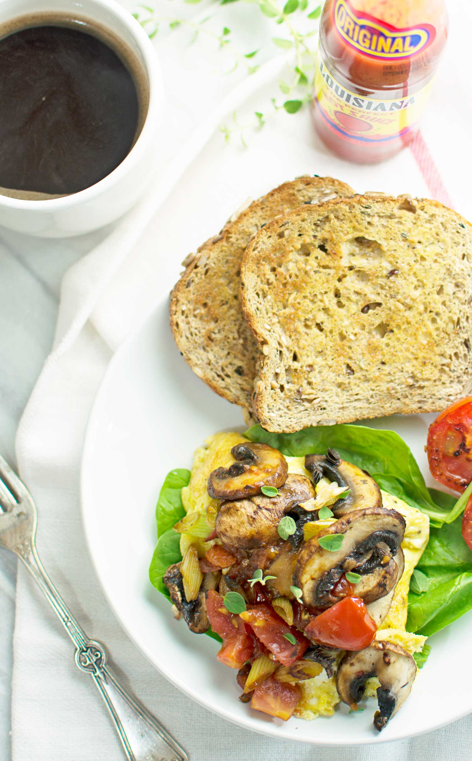Try this Easy to Make Omelette with lots of Veggies! A tasty way to start your day or enjoy as a light dinner. Find the recipe @LittleFiggyFood