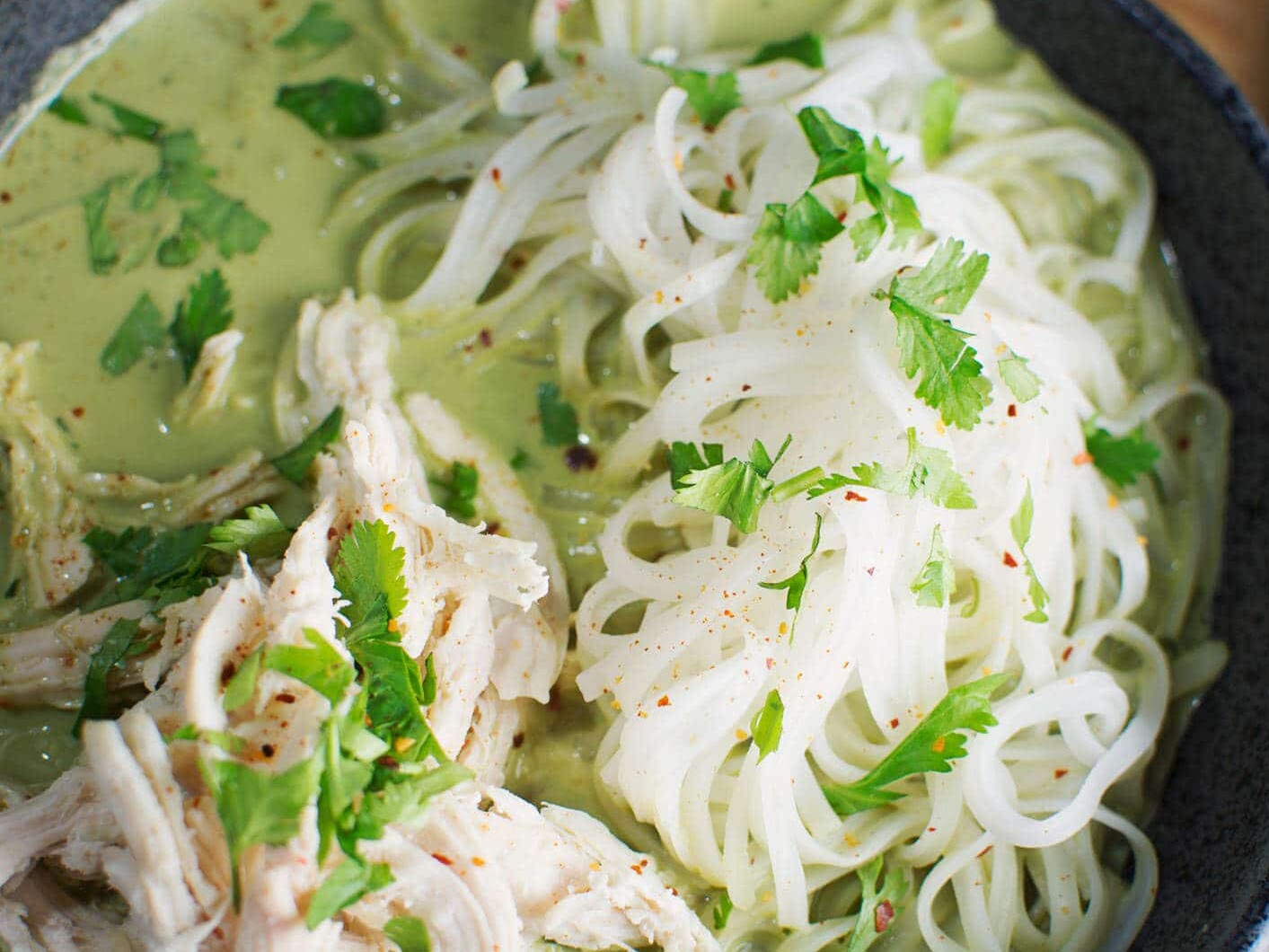 Green curry soup with noodles and chicken