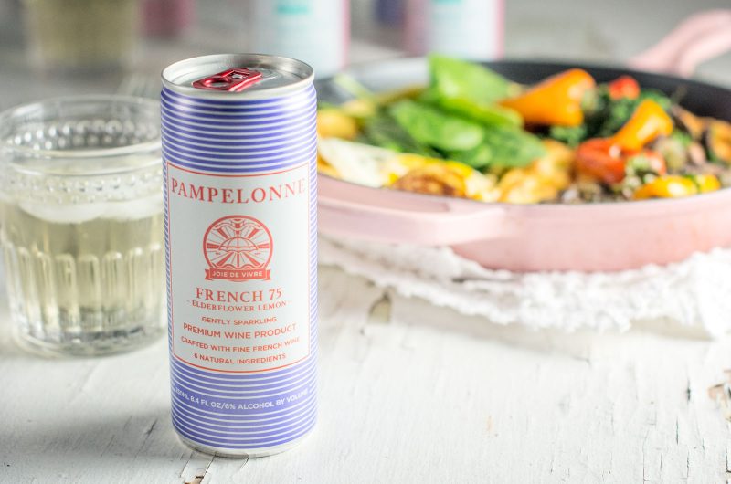 Pampelonne French 75, the perfect addition to your boozy brunch! Get the Savory Dutch Baby recipe and find out more about these incredible Pampelonne wine cocktails at Little Figgy Food. @enjoyPampelonne @LeCreuset #ad #LeCreusetLove #EnjoyPampelonne