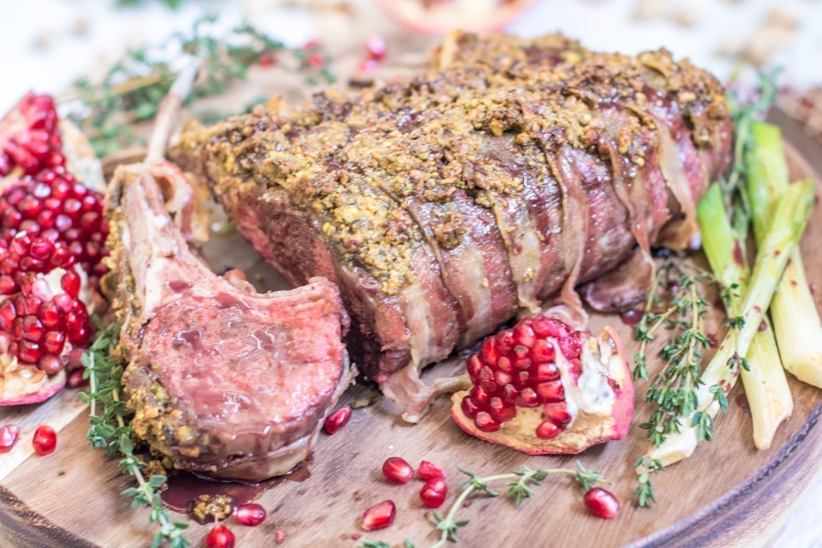 Pancetta wrapped Pistachio Rack of Lamb, get the recipe at Little Figgy Food! @TheFreshMarket #TFMfortheHolidays #ad