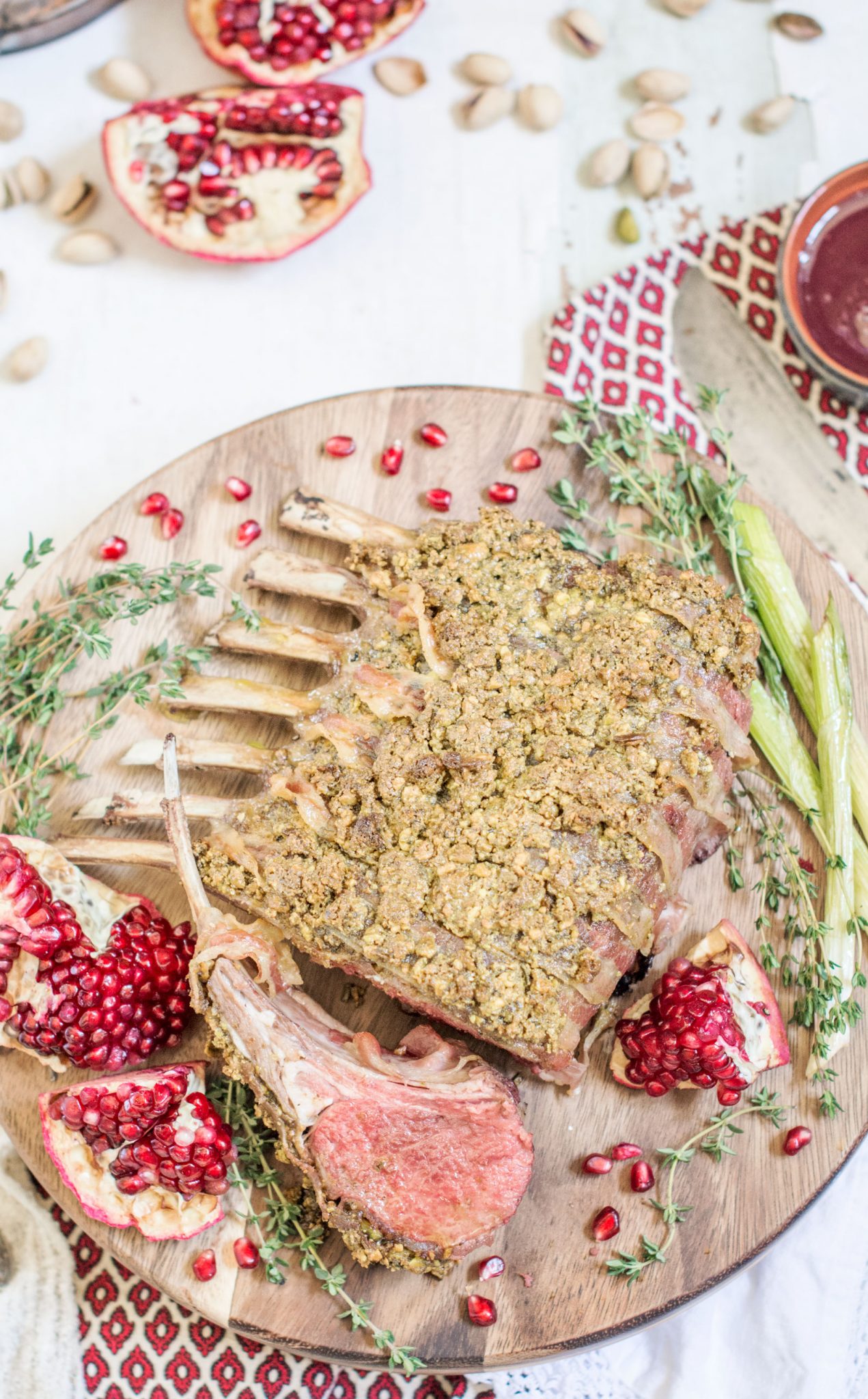 Pancetta wrapped Pistachio Rack of Lamb, get the recipe at Little Figgy Food! @TheFreshMarket #TFMfortheHolidays #ad