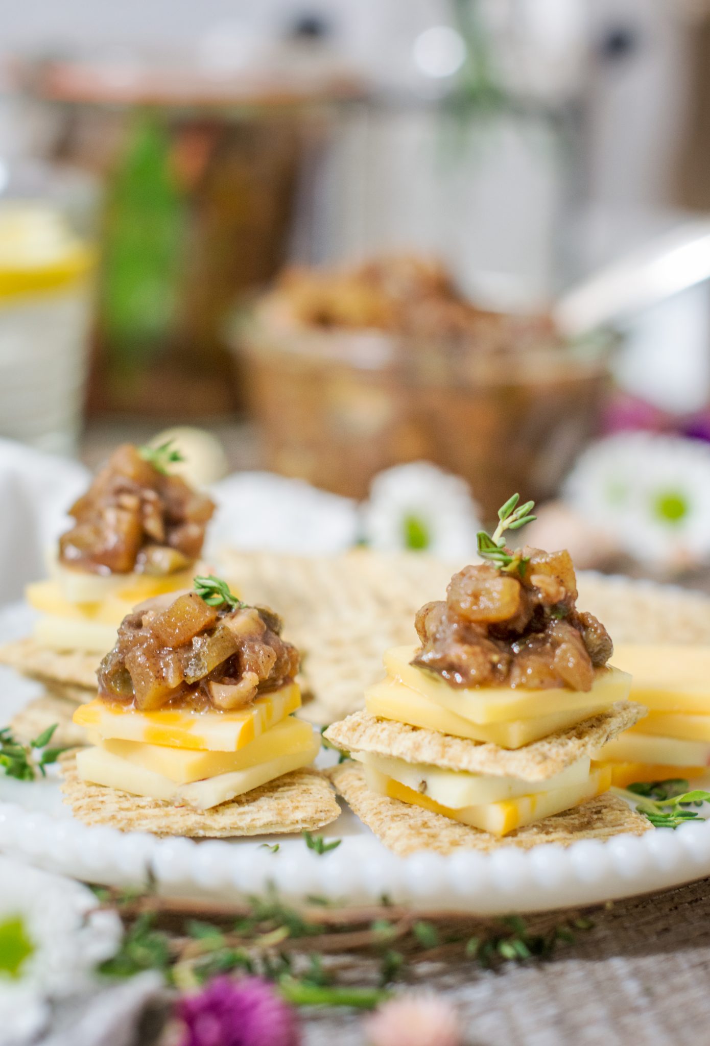 close up of crackers with toppings