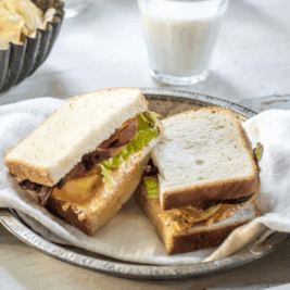 BLT sandwich with chips and milk