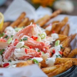 Loaded Crab Fries with garlic aioli and lemon