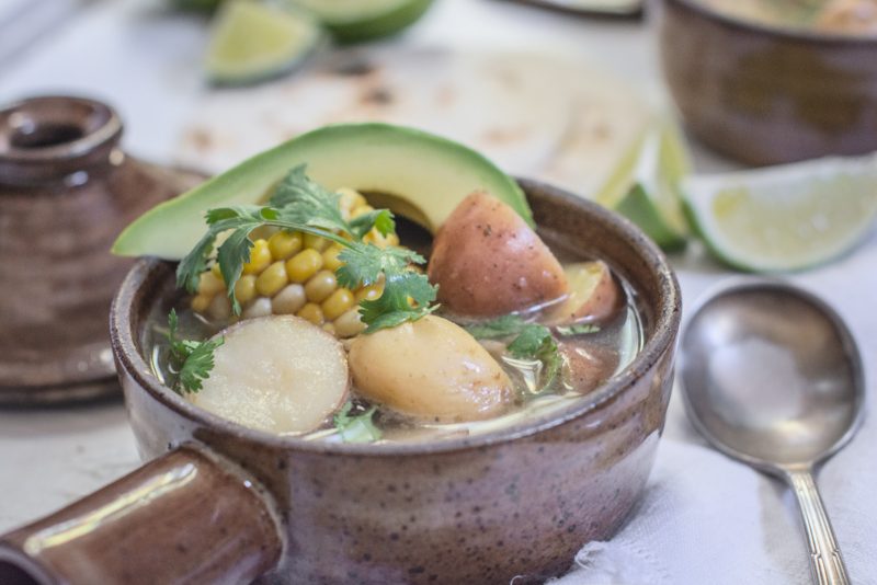 Ajiaco - Chicken Corn and Potato Stew with avocado slices