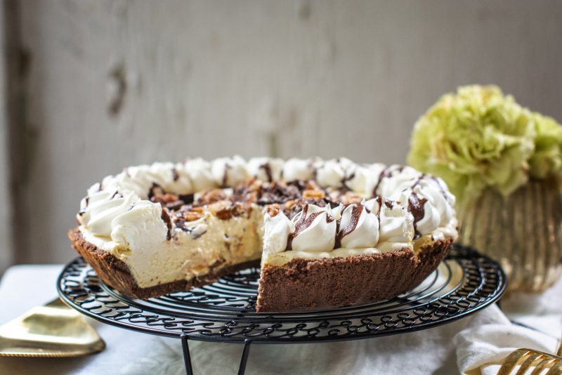 Sliced Turtle Pie with flowers in background