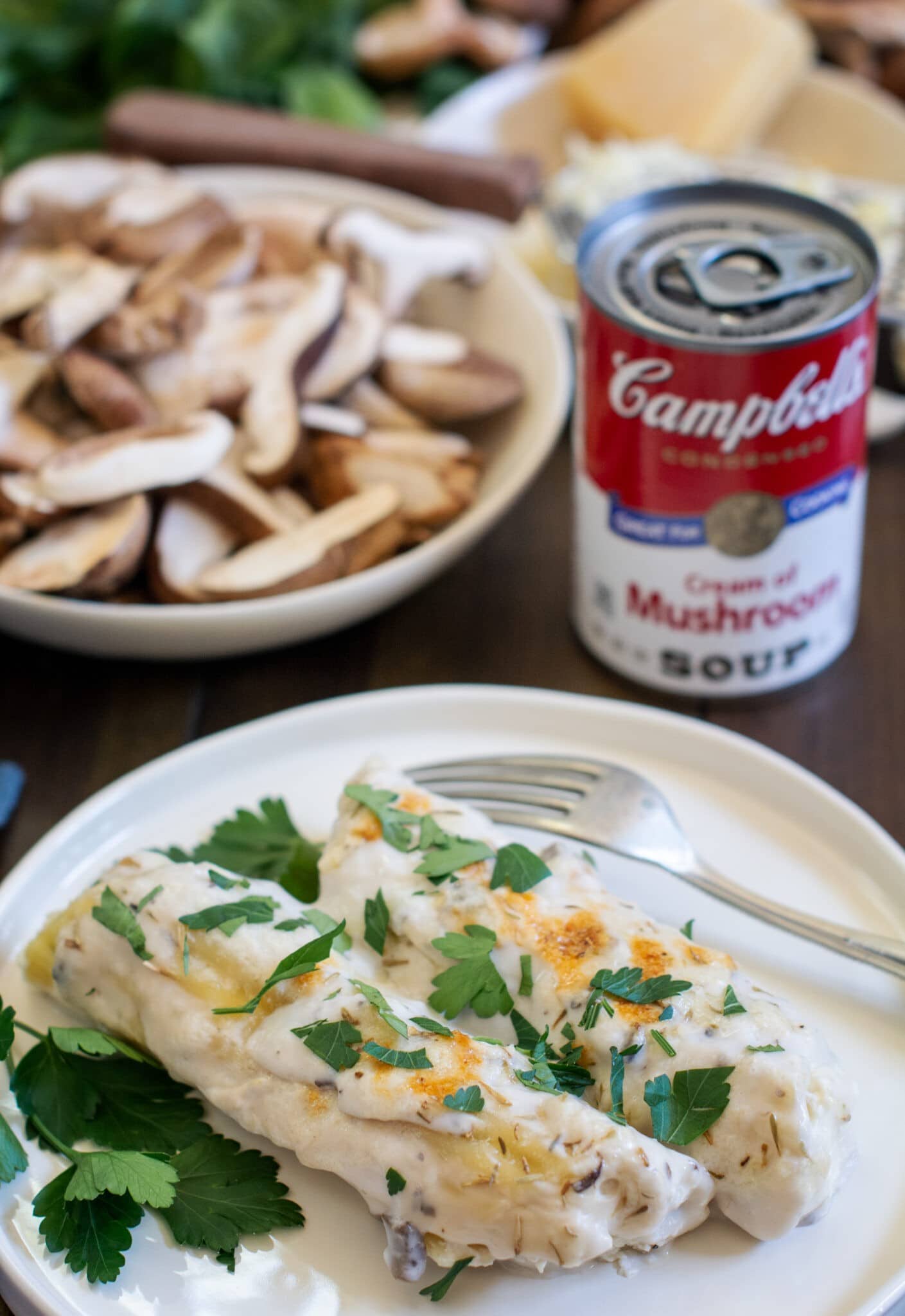 Mushroom Ricotta Manicotti on white plate with Campbells Condensed Soup in background