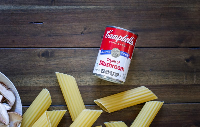 Campbells Condensed Cream of Mushroom Soup on wood table