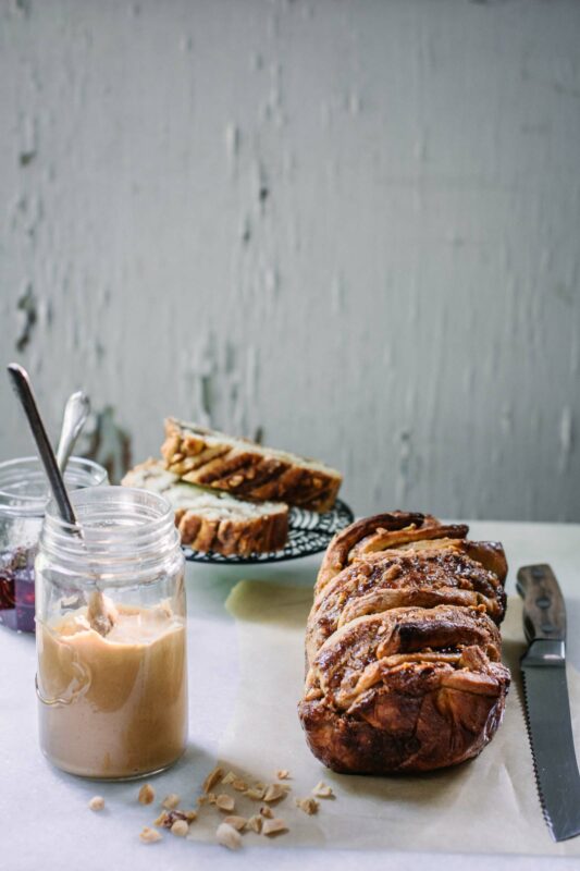 Babka with jar of creamy peanut butter