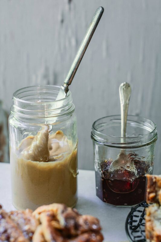 Jars of jam and creamy peanut butter