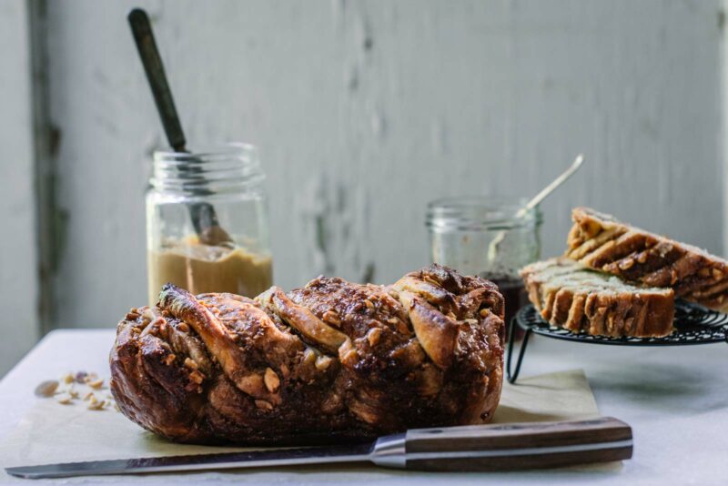 Ready to cut sweet bread, a loaf of peanut butter and jelly babka