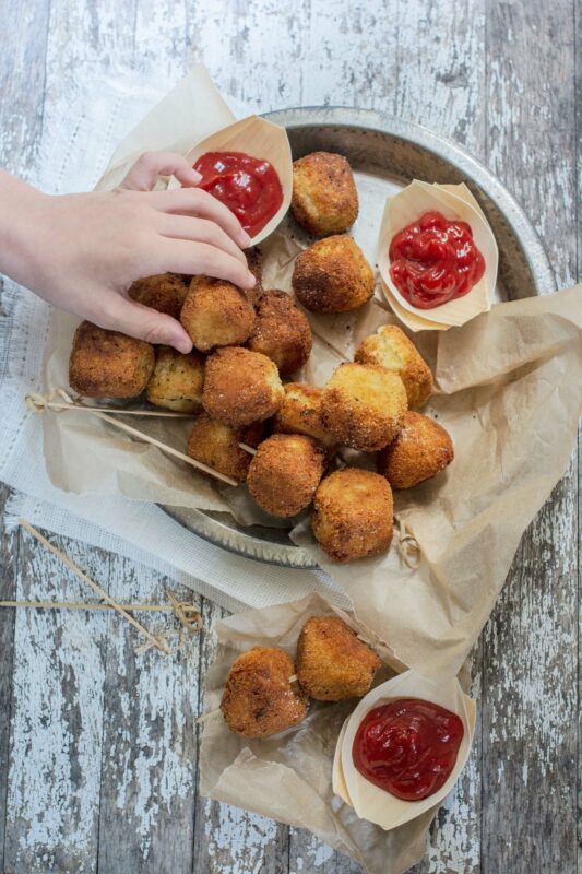 Kid friendly potato nugget snacks with ketchup