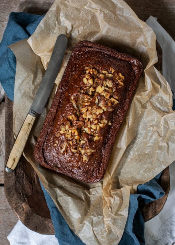 A walnut topped loaf of sweet bread