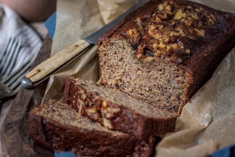 A loaf of sliced bread with walnuts