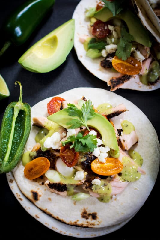 Softshell salmon tacos with tomatoes and salsa