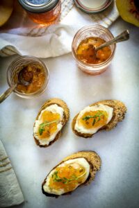Pepper Peach Jam recipe used to top off brie and toasted baguettes