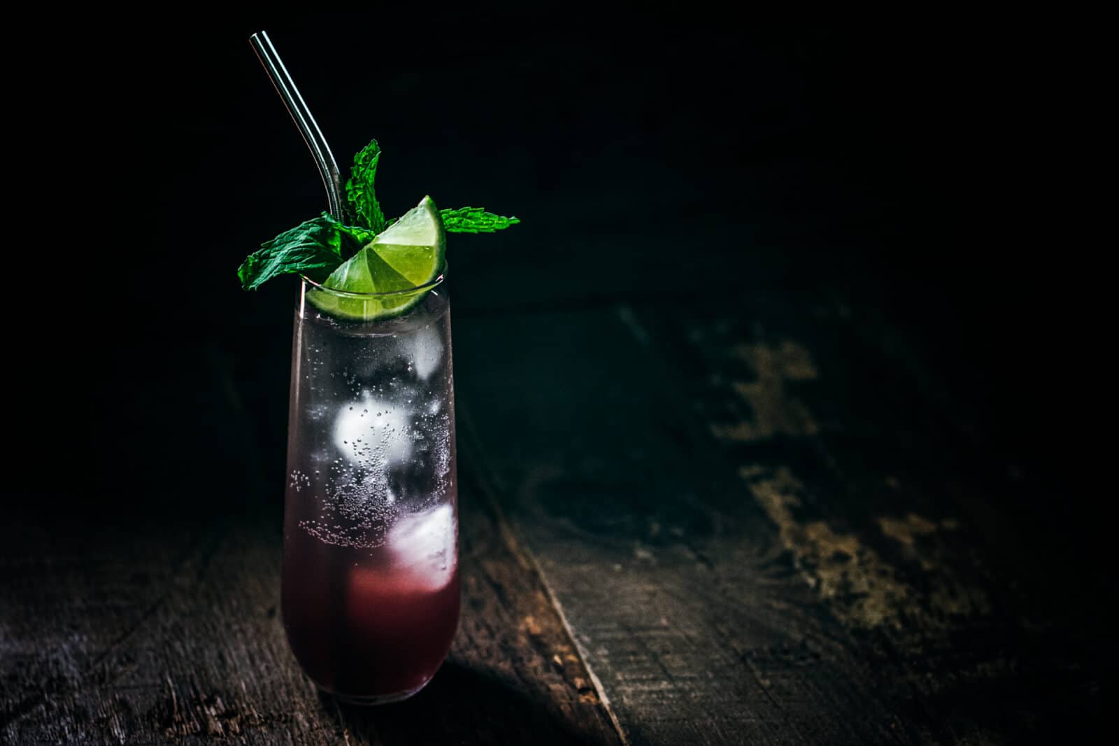 Mulled winter sangria mixed drink with lime and mint