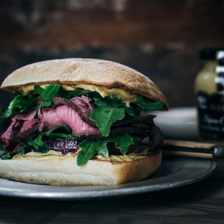 Sliced steak and caramelized onion ciabatta sandwich