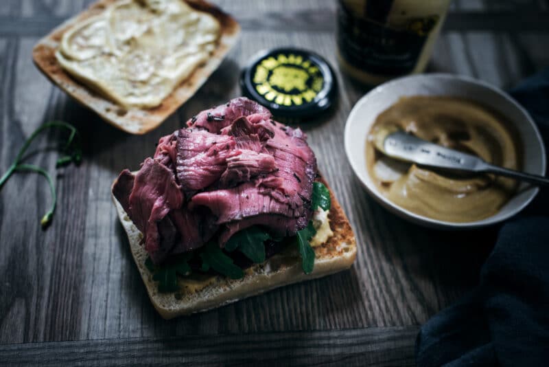 Sliced steak on sandwich