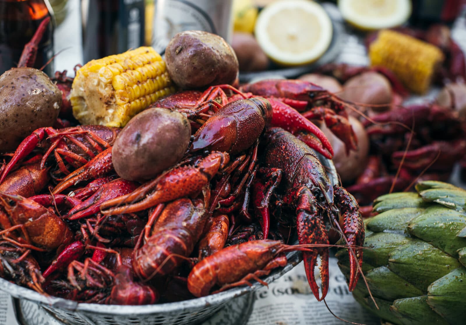 Basket of crawdads with artichokes corn and Idaho red potatoes