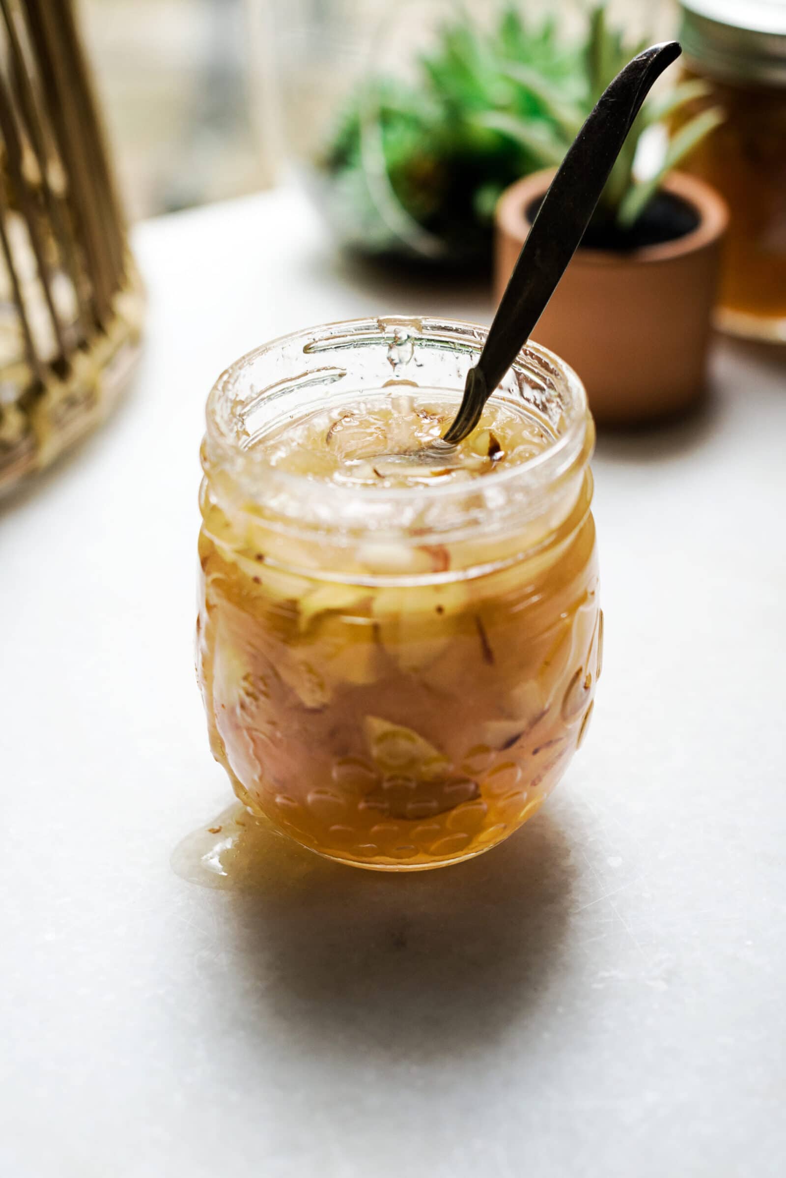 Fruit Preserves with almonds and peaches in jar - home canning