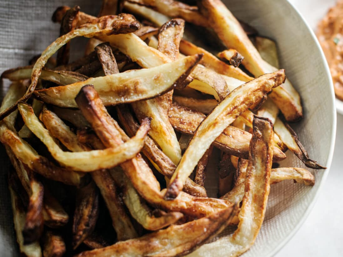 Bowl of crispy homemade fries.