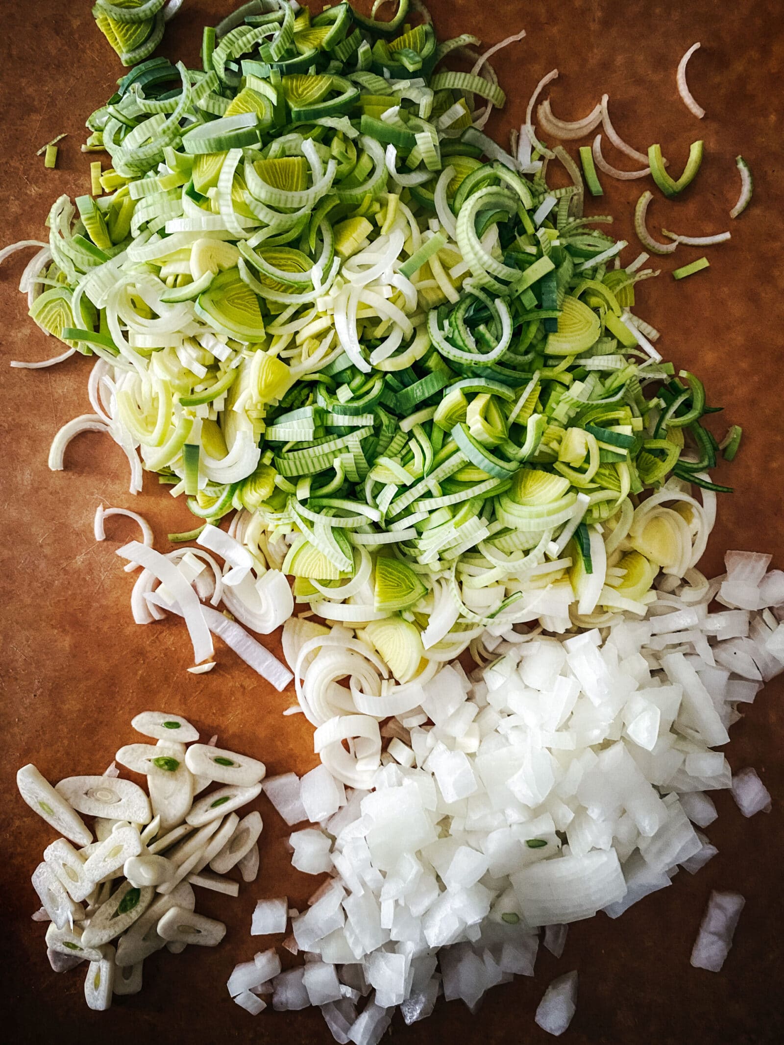 Chopped vegetables on board