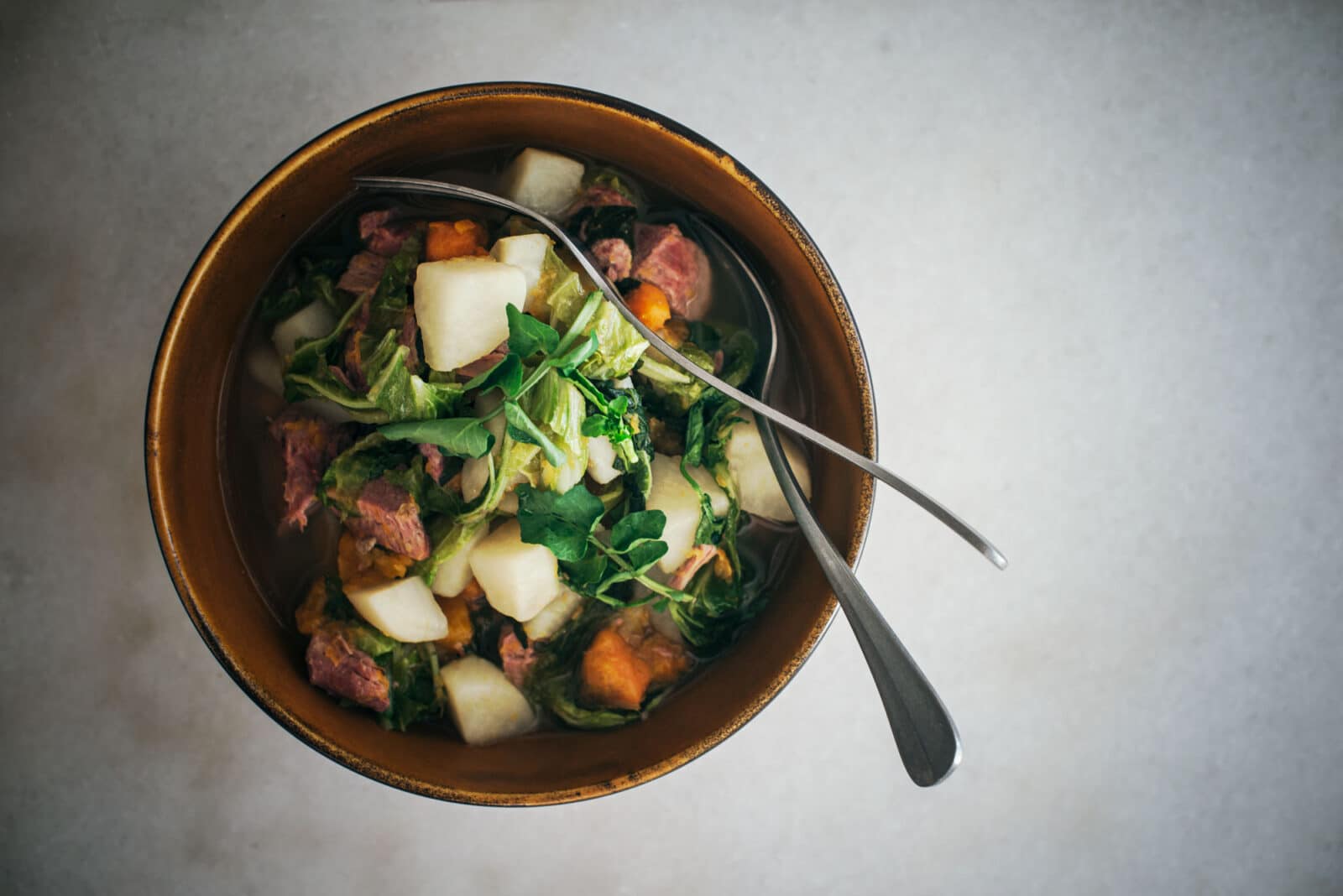Serving a bowl of Maori Boil Up
