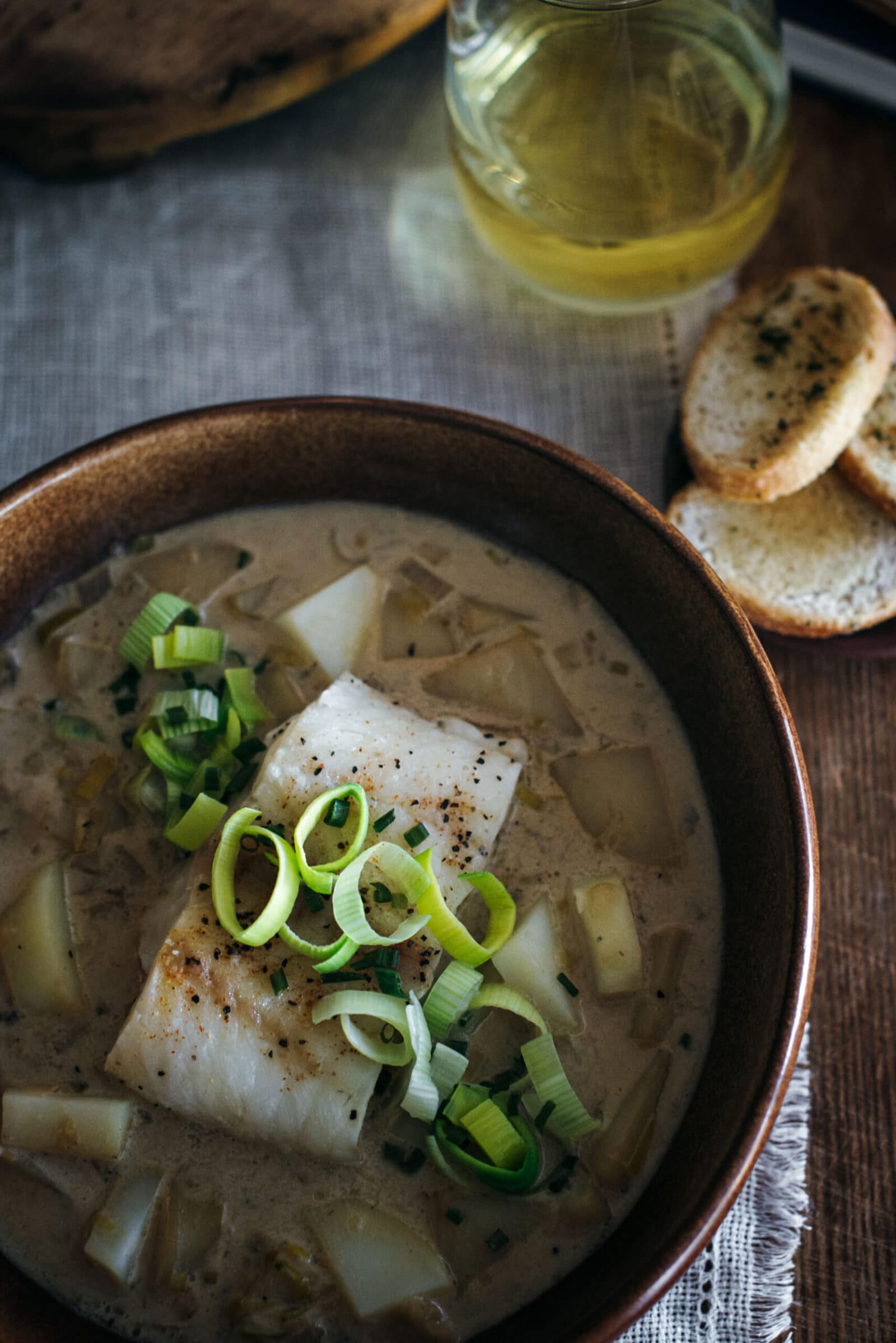 Soup with leeks potatoes and cod