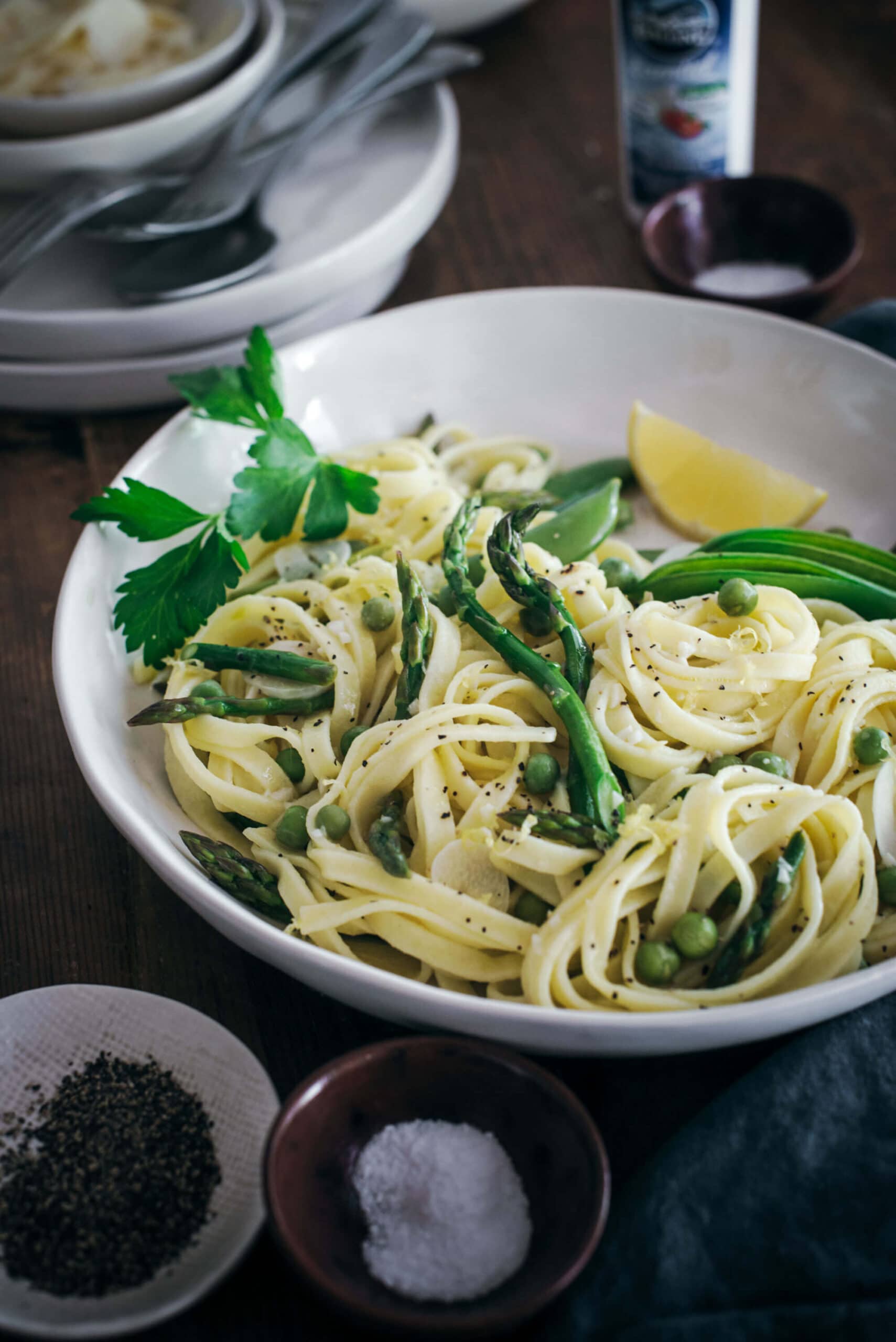 Serving pea and asparagus pasta for dinner