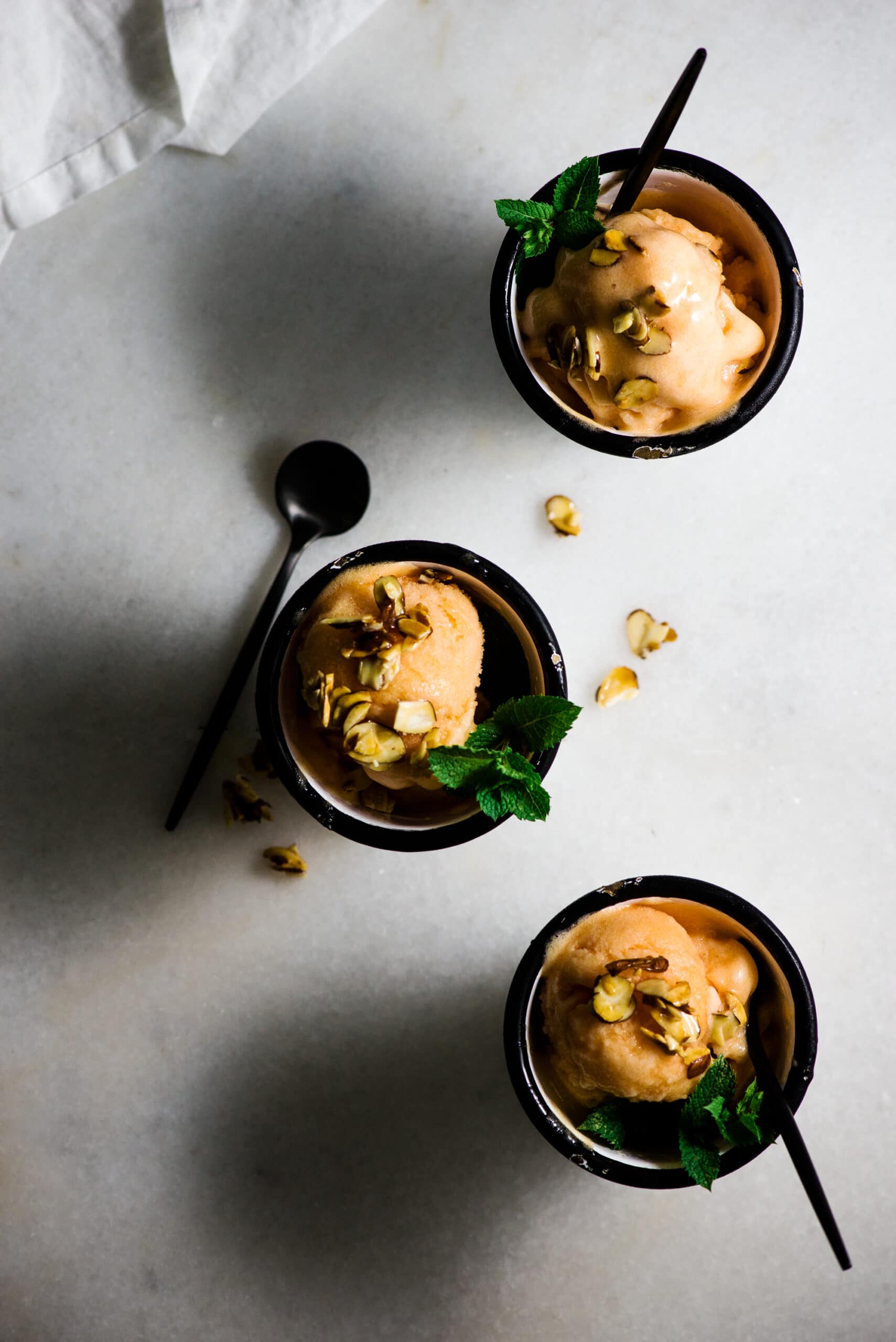 cups of honey and peach frozen dessert