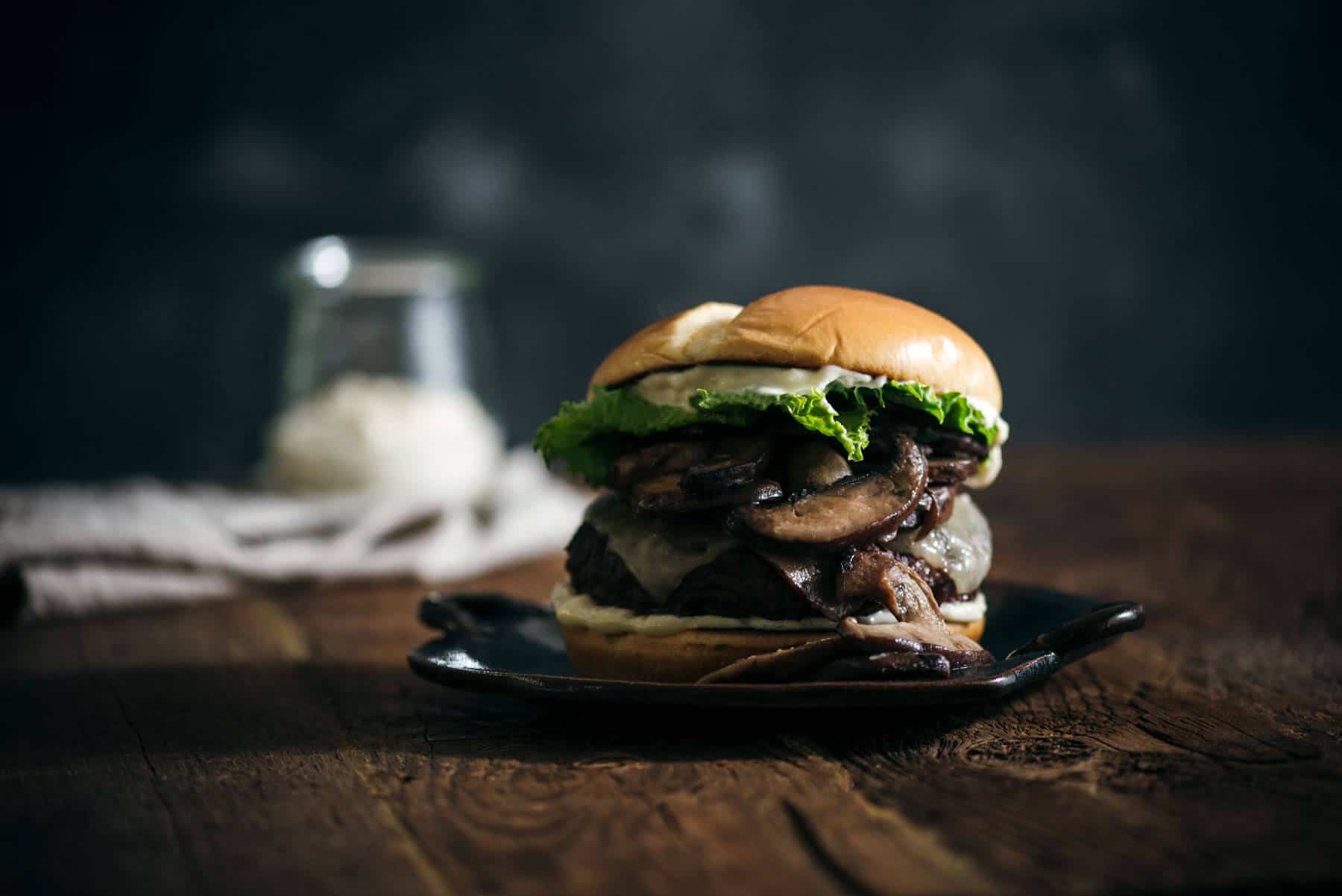 Hamburger with mushrooms and swiss cheese