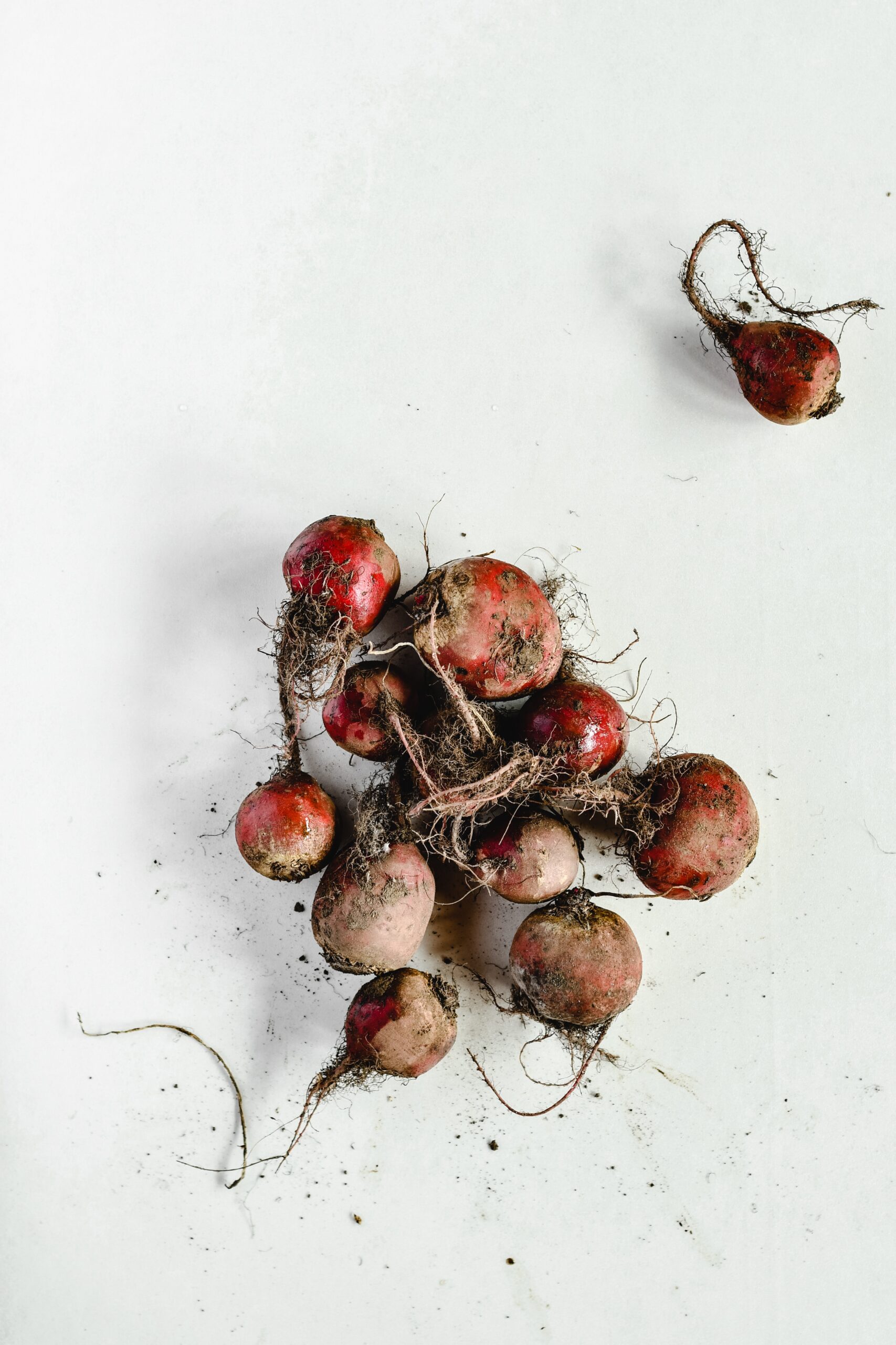 Winter food storage - beets - root vegetables - beets on white table
