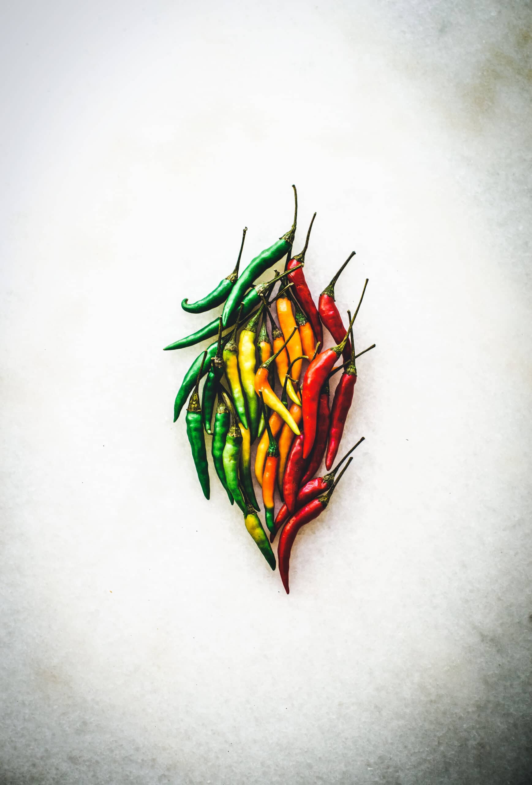 Marble surface with a variety of Thai hot peppers