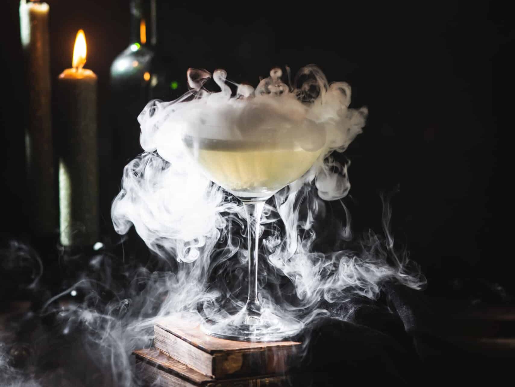 Smoke swirling around a mysterious cocktail glass.