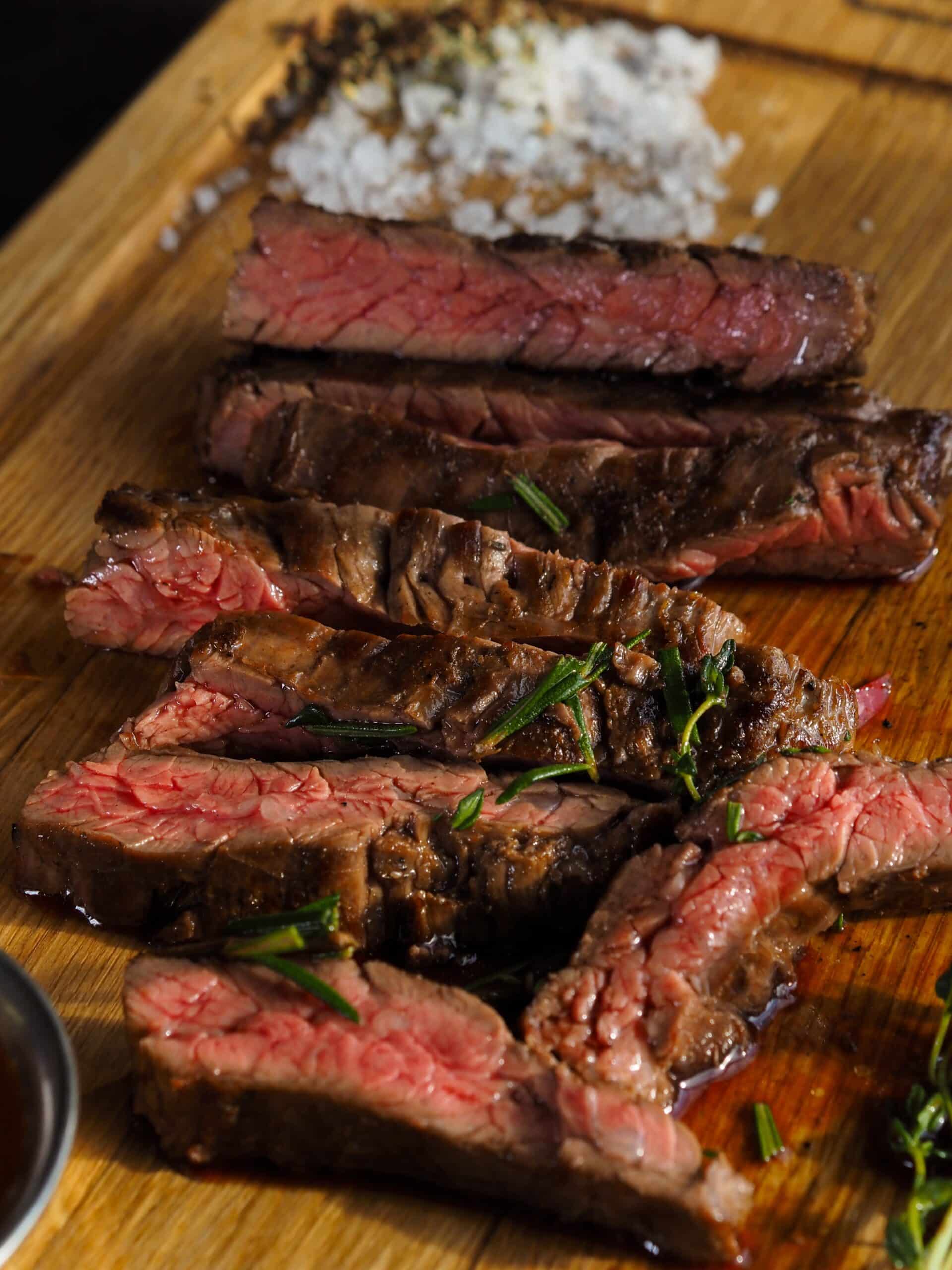 Sliced steak. Learn the 5 steps on how to get a perect crust on your steak.